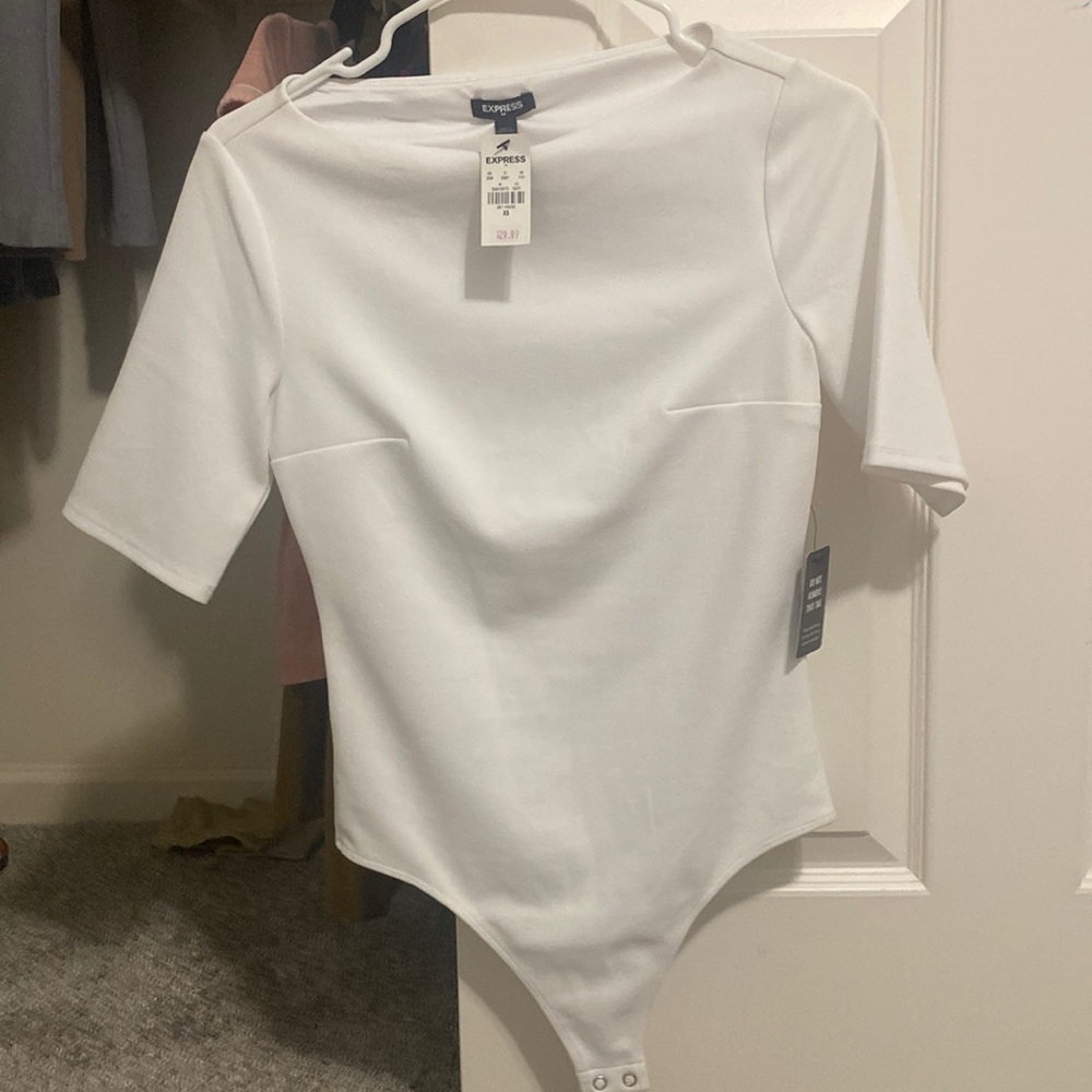 White body suit - too small for me. No stains, brand new from Express.